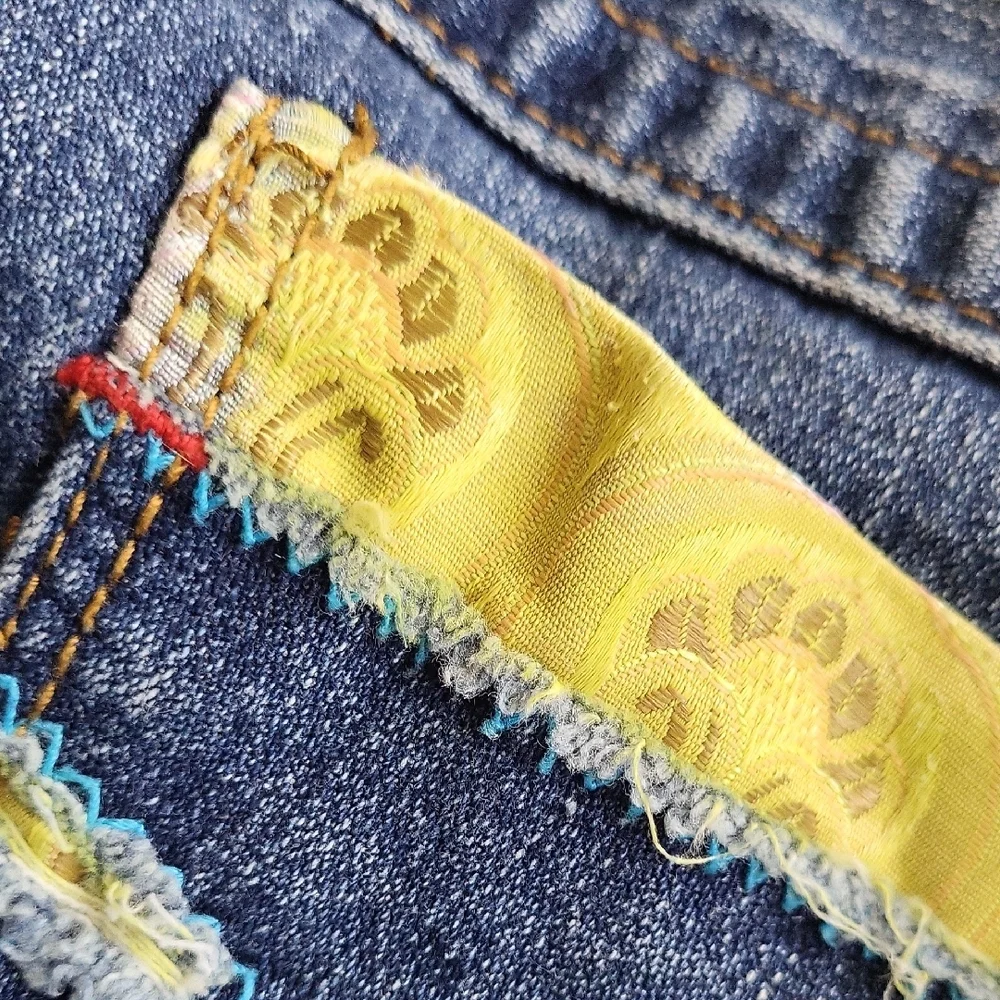 True Religion Denim Jeans With Yellow Accent Pocket. Row 29 Seat 34
